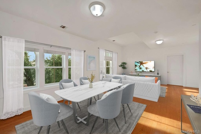 Virtually staged living room/dining area