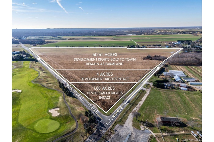 Aerial view of sparsely populated area featuring extensive farmland