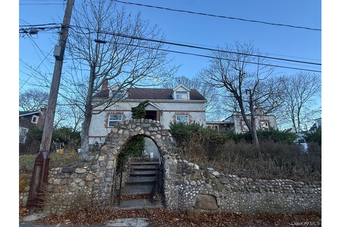 View of front of house with a chimney