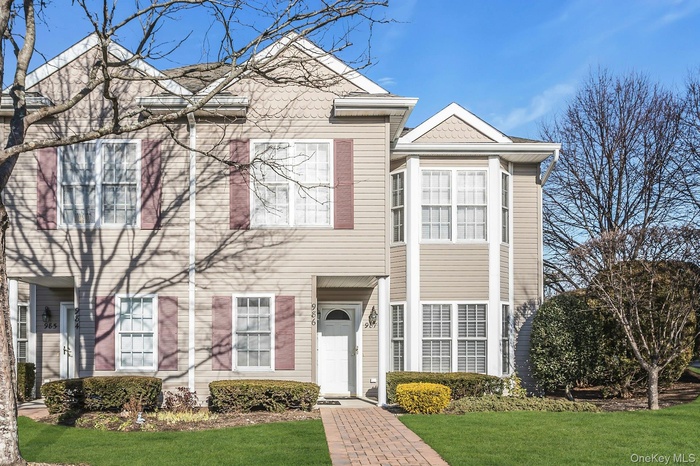 View of front of property featuring a front lawn