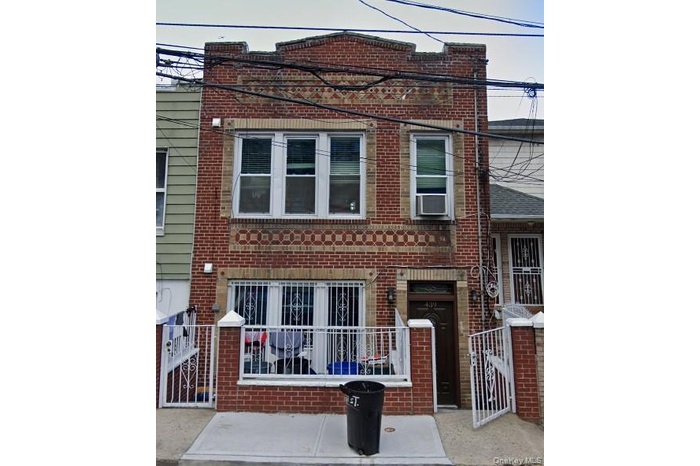 View of front of property with brick siding