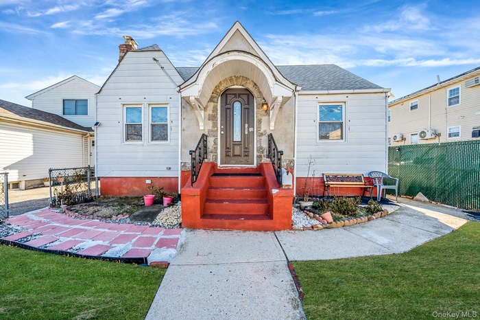 View of front of property featuring roof with shingles