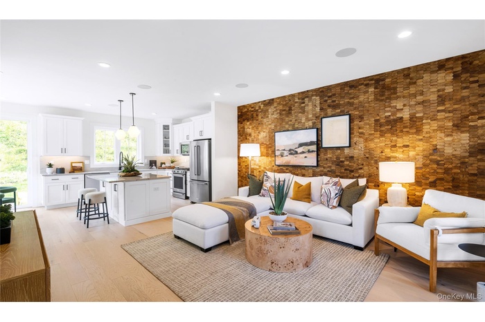 Living room with recessed lighting and light wood-type flooring