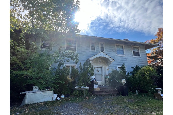 Colonial inspired home with a chimney