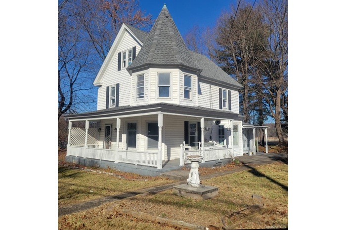 Victorian-style house with wrap around  porch