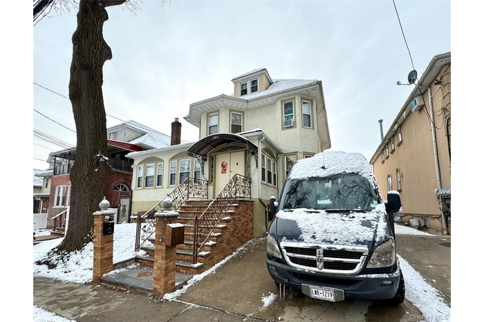 View of front of home with stucco siding