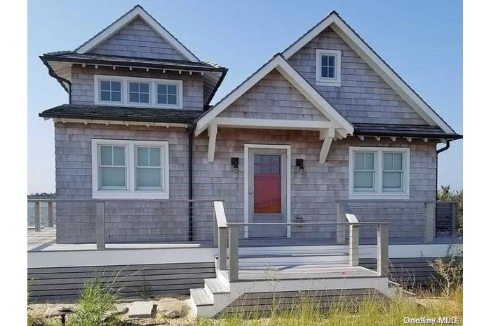View of front of house featuring a deck