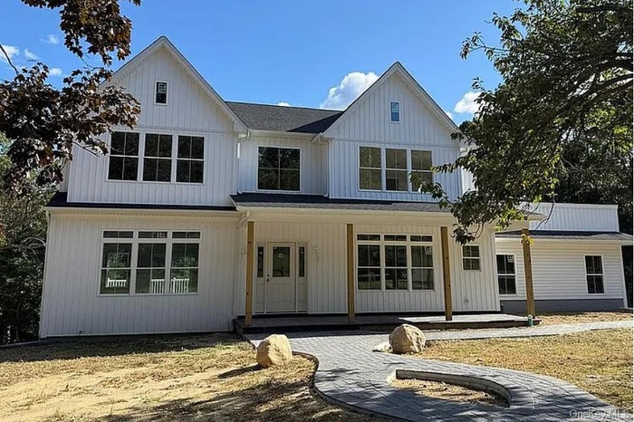 Modern farmhouse style home with a porch