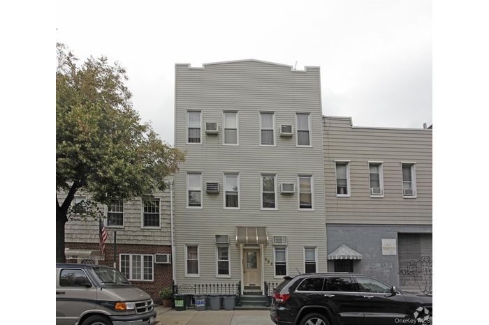 View of front of house with brick siding