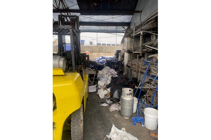 Garage with metal wall