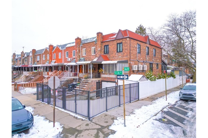 View of building exterior with a residential view