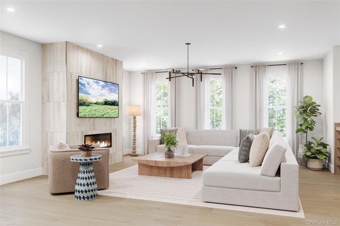 Great room with lots of light and cozy gas fireplace