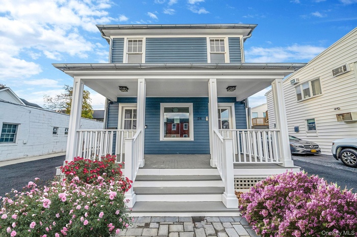 Property entrance with a porch