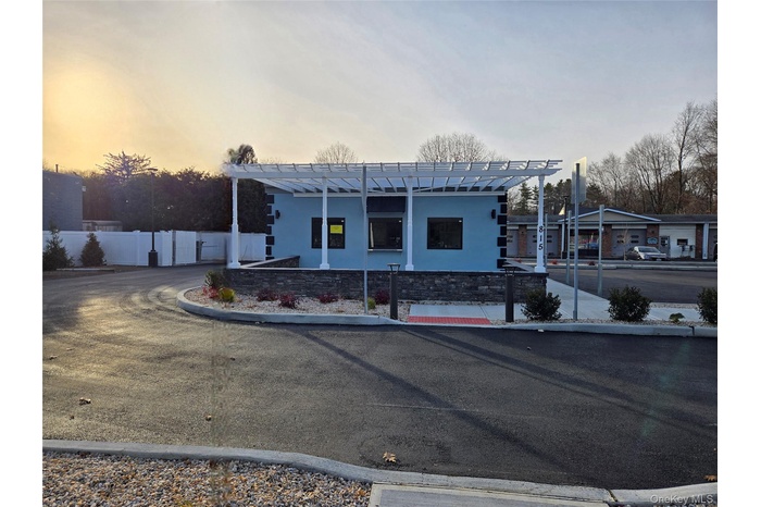View of front of home featuring stucco siding
