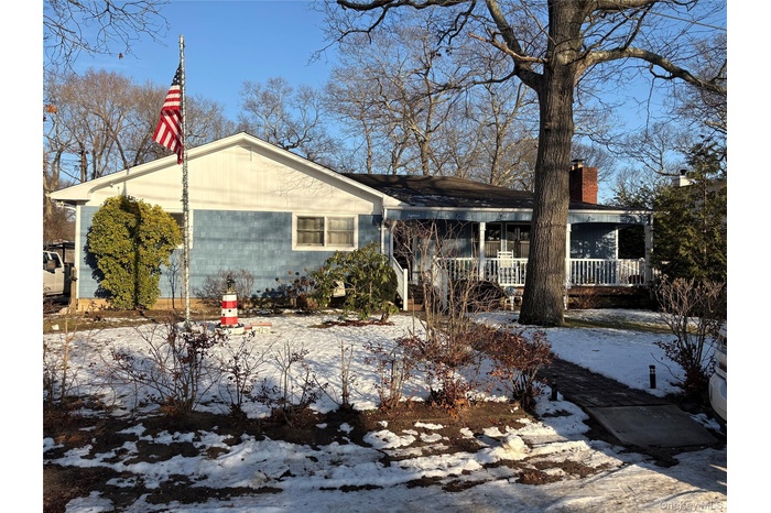 View of front of property with covered porch