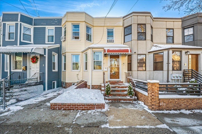 View of front facade featuring entry steps
