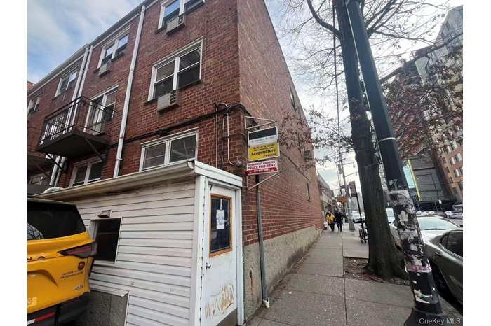 View of home's exterior with brick siding