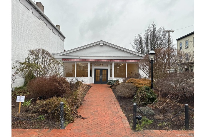 View of front of house featuring french doors