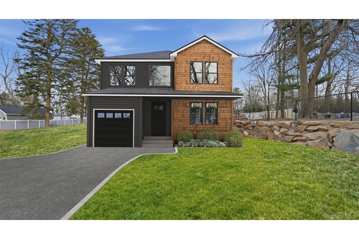 Rendering of Residence featuring a shingled roof, asphalt driveway, and an attached garage