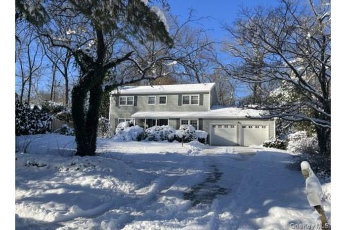 View of front of home with an attached garage