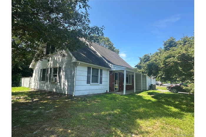 Front of House with a Covered Porch  and 2 Car Garage