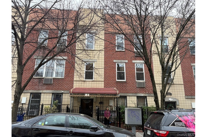 View of front of home with brick siding