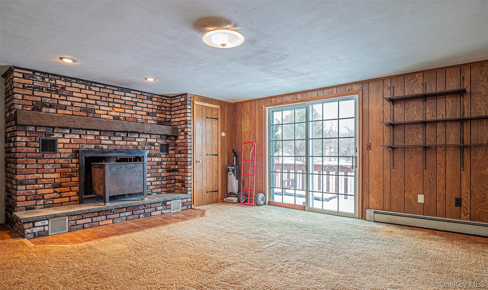 Family room with wood stove.
