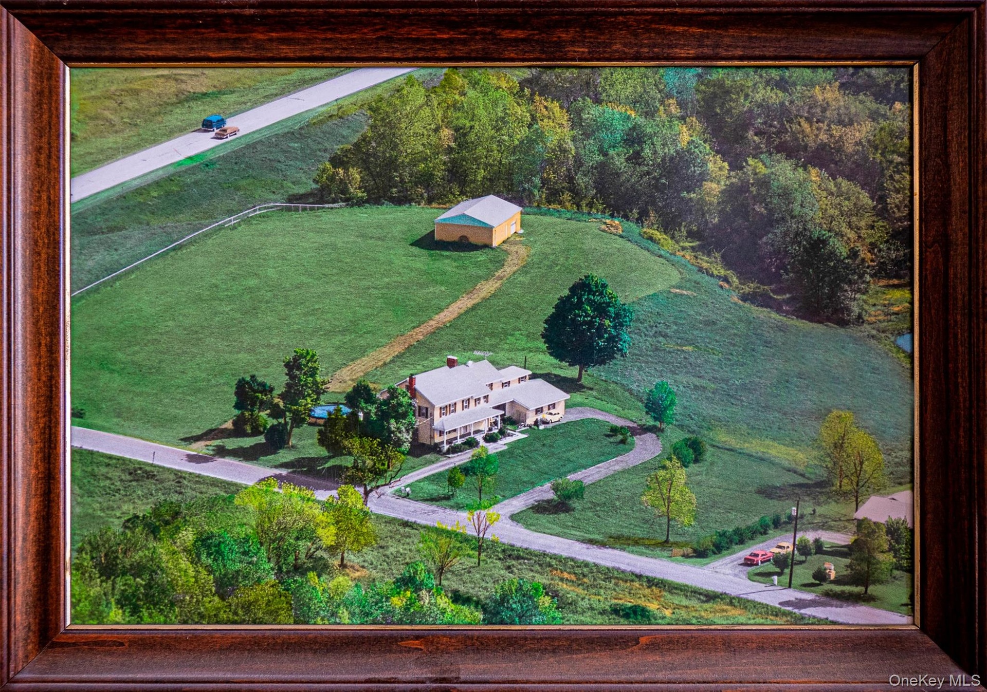 Aerial overview of property in the Summer.