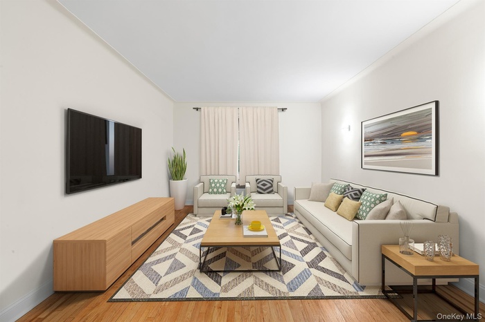 Living room with light wood-style flooring