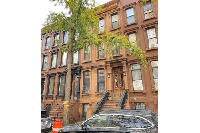 View of front facade with a residential view