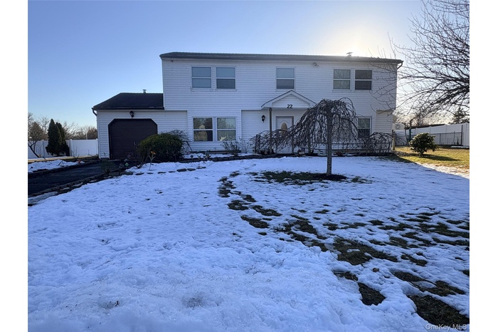 View of front facade with an attached garage