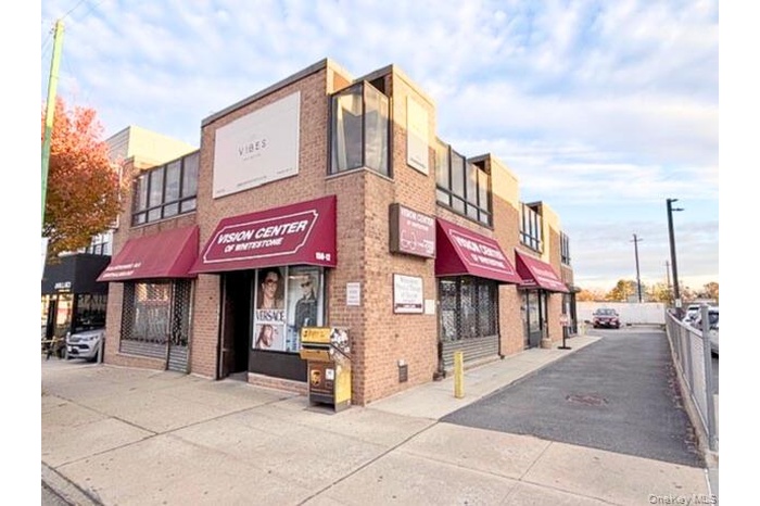 View of building exterior front & driveway. direct street access.
