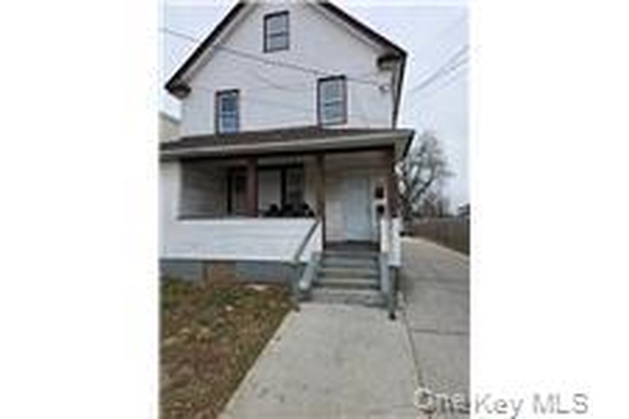 View of front of house featuring covered porch