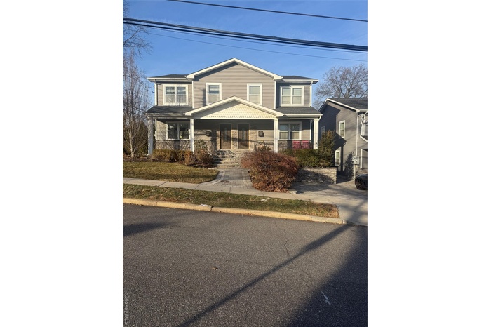 View of front facade with covered porch