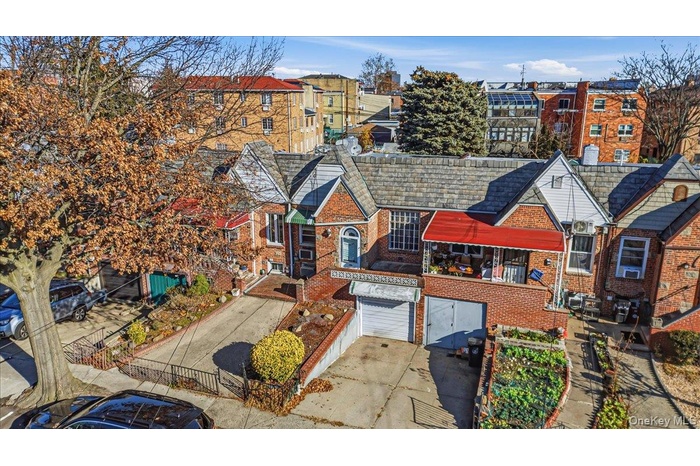 View of front of house with brick siding
