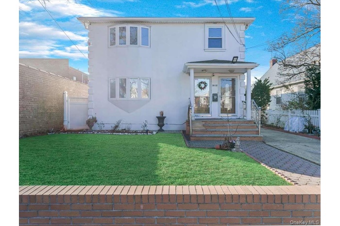 View of front of house with stucco siding
