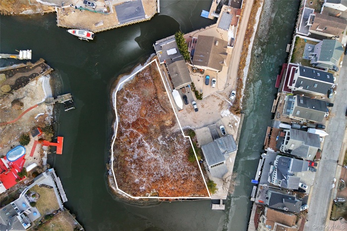 View of property location with property boundaries highlighted and nearby suburban area