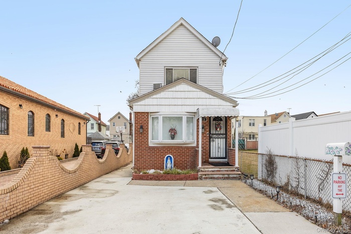 View of front of home with brick siding