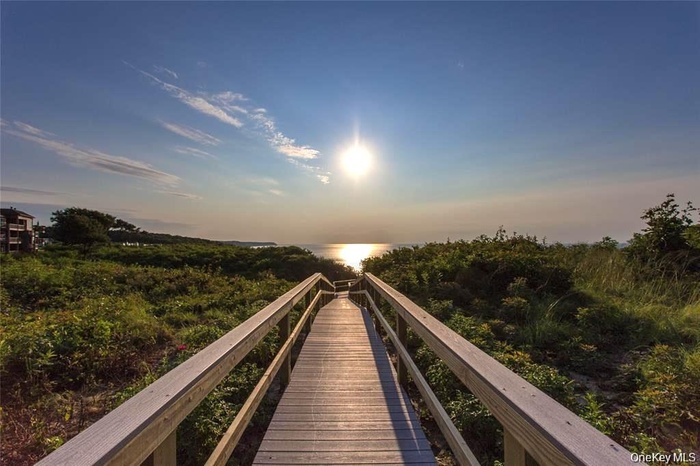 Surrounding community featuring a water view