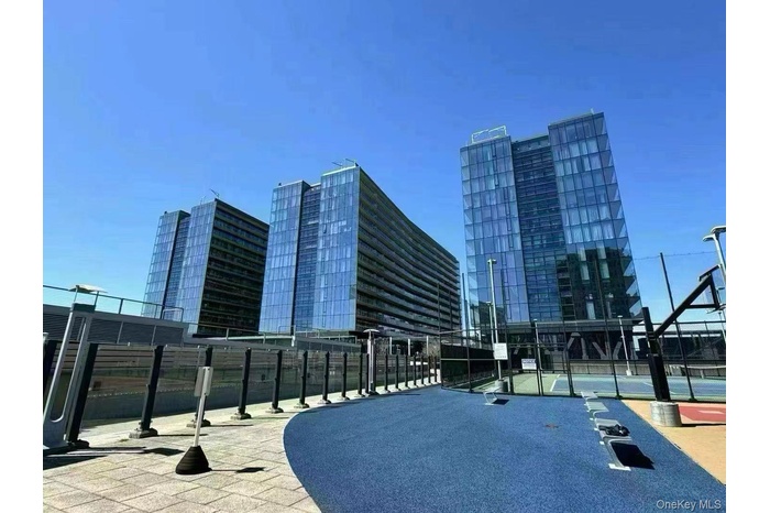 Surrounding community with a city view and a patio