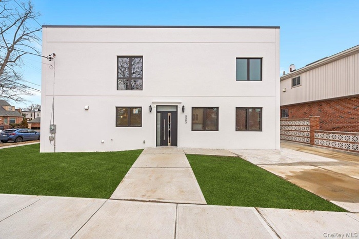 View of front of home with stucco siding