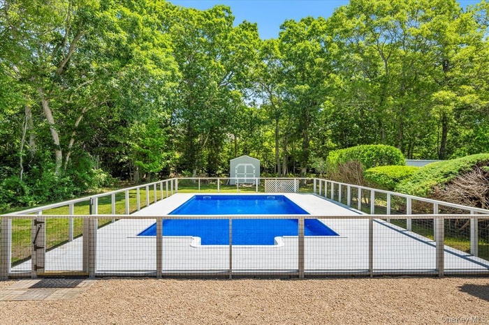 Backyard pool with patio area