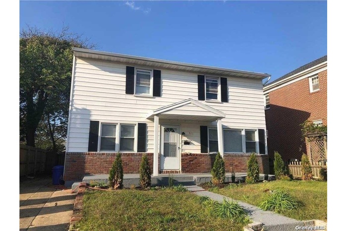 View of front of home with a front lawn
