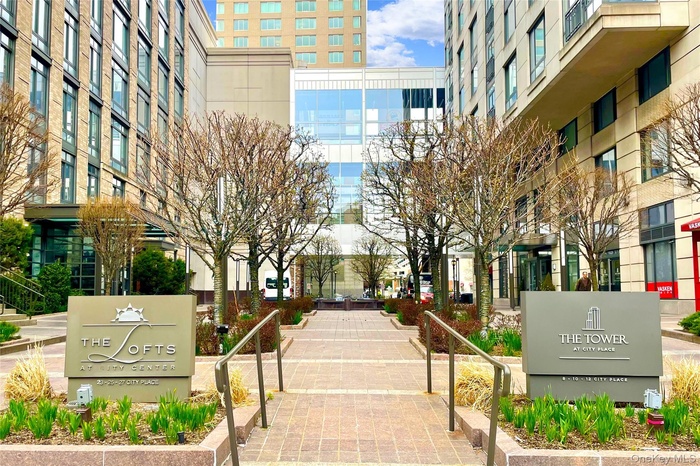 Welcome to the Lofts at City Place! View of the Beautiful and Welcoming Private Front Courtyard.
