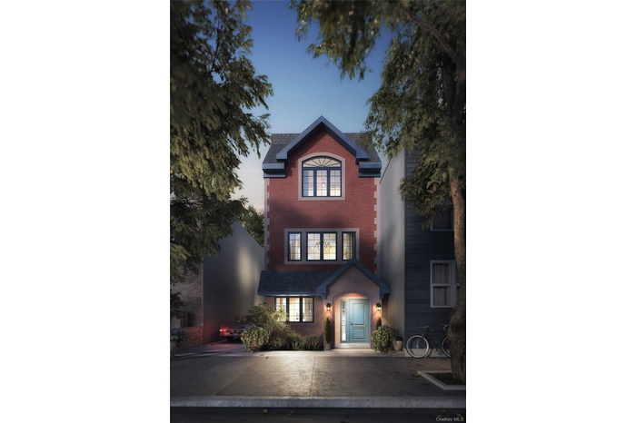 Traditional-style house with brick siding
