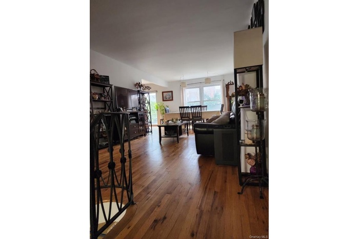 Living room featuring hardwood / wood-style flooring
