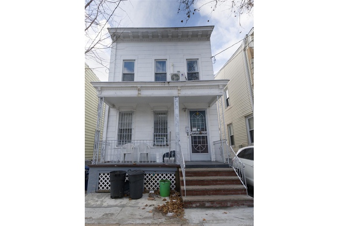 View of front of property with a porch