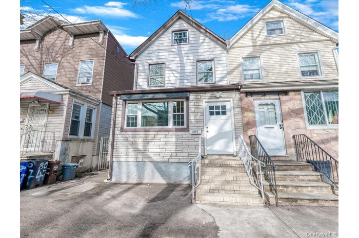 View of front of property with stone siding