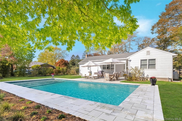 Swimming pool featuring a patio area