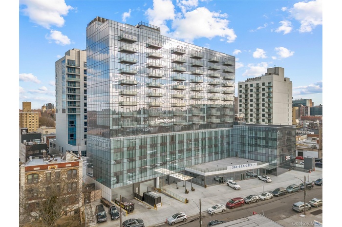 View of apartment building / complex with a city view